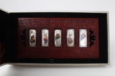 Lot 147 - China - .999 silver Ingots, colour printed with tigers x 5 at 10gms each, fitted into display plaque (N.B. Cased with Certificate of Authenticity) and dated 2010 (Silver ingot set)