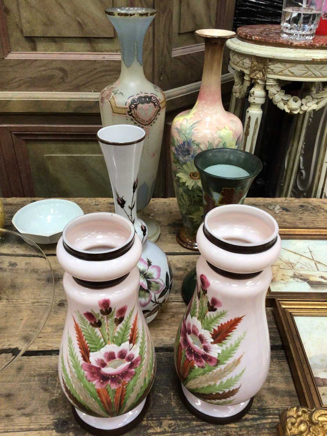 Lot 30 - A Doulton Lambeth vase painted with flowers, a Dutch Art Nouveau pottery vase, and four enamelled glass vases (6)