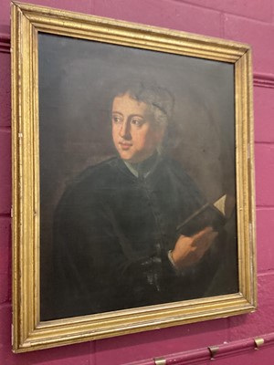 Lot 130 - English school early 19th century, a portrait of a scholar holding a book, oil on canvas in gilt frame 75 x 62cm