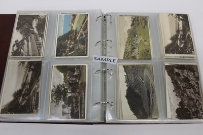 Lot 1416 - Postcards Collection of Felixstowe in two albums including real photographic, topography, views, beach scenes, the pier and other landmarks, some early