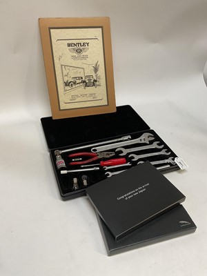 Lot 2011 - Jaguar owners tool kit, together with Jaguar owners pack and a vintage Bentley advert (3)