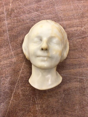 Lot 93 - Simulated alabaster wall mask of young girl