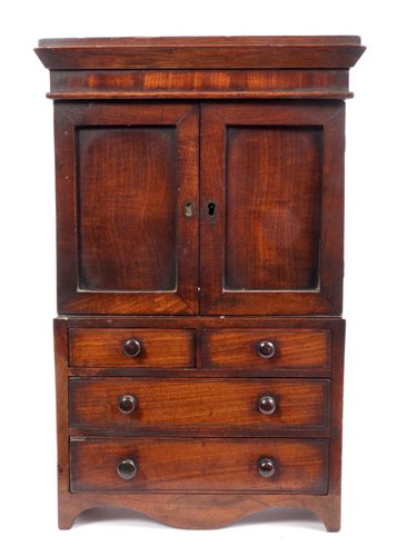 Lot 713 - Victorian mahogany miniature press on chest...
