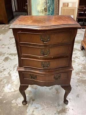 Lot 1178 - Small serpentine chest with sewing accessories