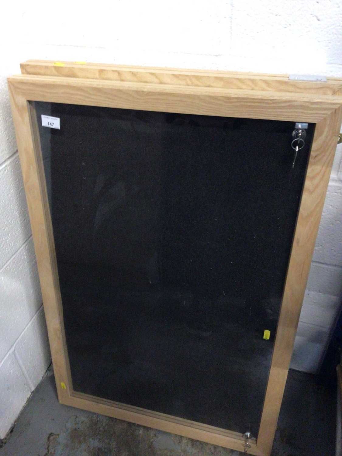 Lot 147 - Two lockable perspex fronted display case