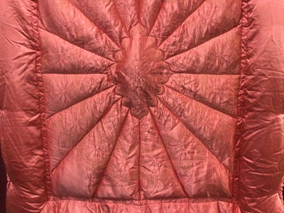 Lot 2093 - Vintage pink satin quilted feather eiderdown by Gaydawm Liverpool, 135 x 160cm approximately.  Vintage patchwork/appliqued padded bed cover in cream, green and floral design, 250 x 280 cm aproxi...