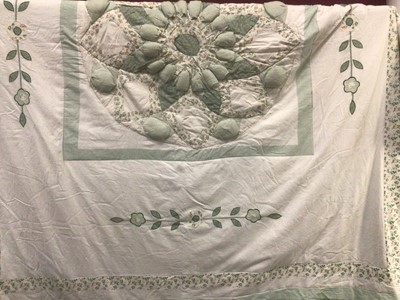 Lot 2093 - Vintage pink satin quilted feather eiderdown by Gaydawm Liverpool, 135 x 160cm approximately.  Vintage patchwork/appliqued padded bed cover in cream, green and floral design, 250 x 280 cm aproxi...