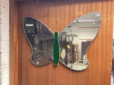 Lot 1130 - Two frameless wall mirrors, one in the form of a butterfly with green tinted body