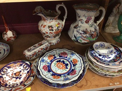 Lot 672 - Two large Masons style jugs by Ashworth and Amherst, together with other Imari style china, including a Derby dish