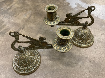 Lot 224 - Pair of Victorian brass candlesticks, with scrolling arm on weighted bases, with registration marks