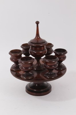 Lot 1024 - 19th century fruitwood treen egg stand