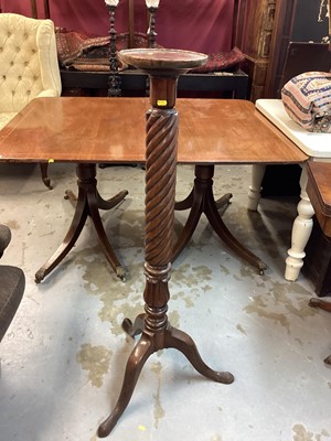 Lot 1148 - Victorian mahogany torchere with circular top and spiral receded column on three hipped splayed legs, 122cm high