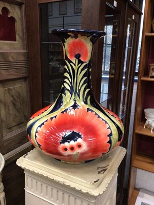 Lot 250 - A large tube lined cornflower vase in the manner of William Moorcroft
