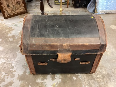 Lot 1163 - 19th century mahogany pole screen on trefoil base, together with a Brass standard lamp, and a dome top trunk (3)