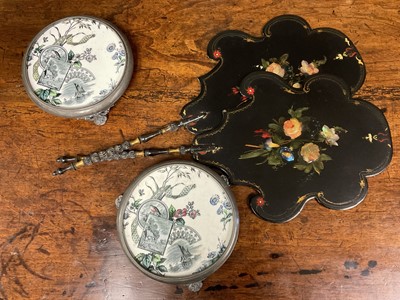 Lot 171 - Pair of Victorian Papier Mache face screens, together with pair of pewter mounted teapot stands