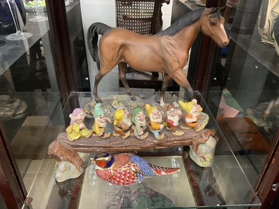 Lot 172 - Doulton Figural group of Disney's seven dwarfs, together with Doulton figure of a horse and a Royal Crown Derby pheasant paperweight