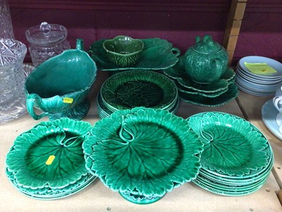 Lot 706 - A group of Wedgwood and other green majolica, including dishes, tazza, teapot, etc