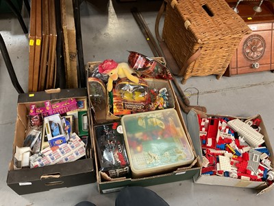 Lot 400 - Two boxes of Lego, Disney Pirates of the Caribbean toys and other toys.