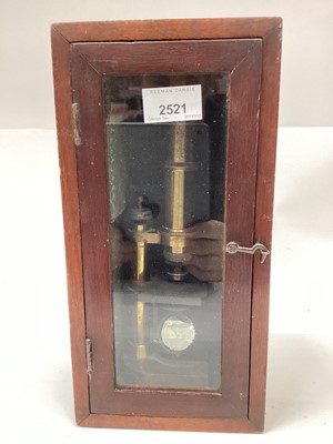 Lot 2521 - Antique brass microscope in mahogany display case