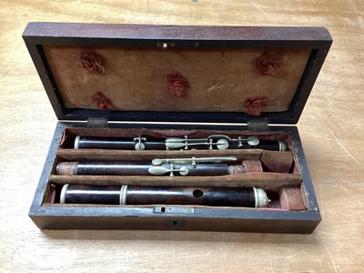 Lot 2217 - 19th century hardwood flute in rosewood case