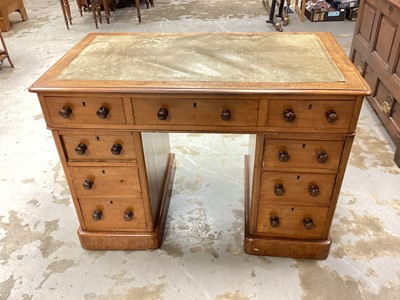 Lot 1203 - Victorian mahogany twin pedestal desk with inset leather lined top and nine drawers below, 105cm wide, 60cm deep, 74cm high