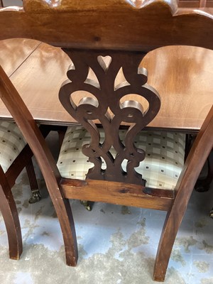 Lot 1213 - Set of eight Georgian style dining chairs with pierced splat backs and padded drop in seats on carved cabriole front legs with claw and ball feet, comprising two carvers and six standards, together...