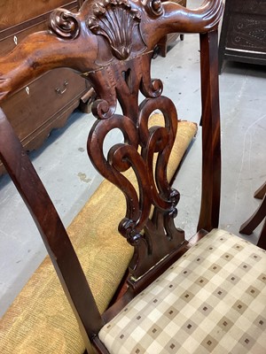 Lot 1213 - Set of eight Georgian style dining chairs with pierced splat backs and padded drop in seats on carved cabriole front legs with claw and ball feet, comprising two carvers and six standards, together...