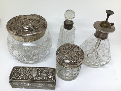 Lot 212 - Five silver mounted glass vanity jars and bottles