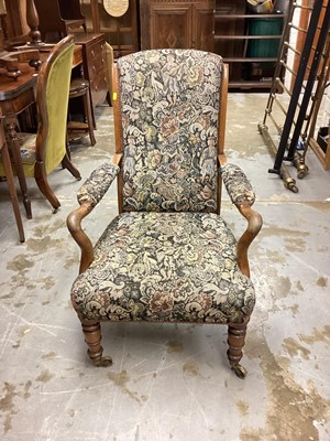 Lot 1220 - Victorian rosewood framed armchair with floral upholstery on turned front legs and brass capped castors