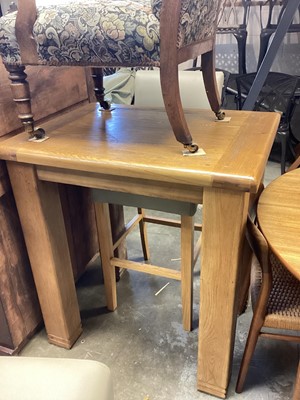 Lot 1223 - Contemporary light oak table on chunky square legs, 90cm wide, 70cm deep, 99cm high, together with two bar chairs