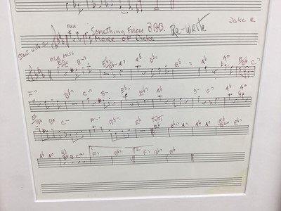 Lot 136 - A framed music score, hand-written, probably from Ronnie Scott's in 1965, with parts for Jimmy Rowles and Duke Ellington, the reverse with a cartoon by an unknown artist