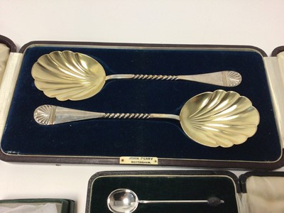 Lot 100 - Pair cased heavy silver servers, six silver coffee bean spoons and napkin ring