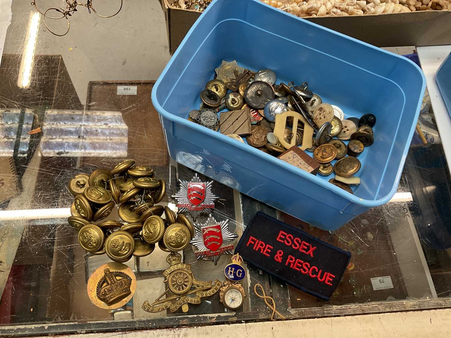 Lot 543 - Collection of Second World War and later cap badges, military buttons and Fire Service badges.