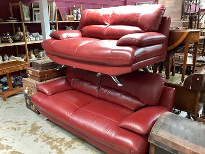 Lot 1243 - Two ensuite modern design red leather and chrome sofas, approximately 205 and 167cm long respectively