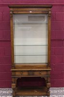 Lot 1390 - Good quality carved oak display cabinet with...