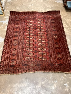 Lot 1521 - Eastern rug with geometric decoration on red and blue ground, 151cm x 124cm