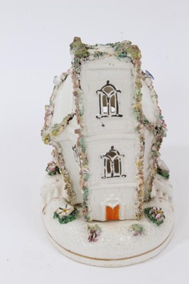 Lot 126 - A Staffordshire porcelain pastille burner and stand, in the form of a church with a crooked tower, circa 1850