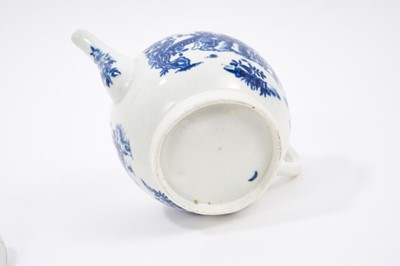 Lot 66 - A Worcester teapot and cover, printed in blue with the Three Ladies pattern, in Chinese style, circa 1775