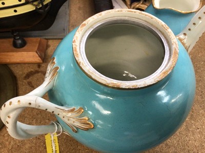 Lot 60 - A Worcester turquoise ground teapot, circa 1770, and a turquoise ground small cream jug