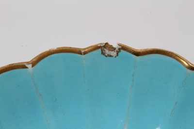 Lot 79 - A Worcester turquoise ground lozenge shaped dish, a saucer dish and a plate, circa 1770