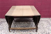 Lot 1405 - Large 19th century oak drop-leaf dining table,...