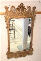 Lot 1409 - George II-style silvered wall mirror, shaped...