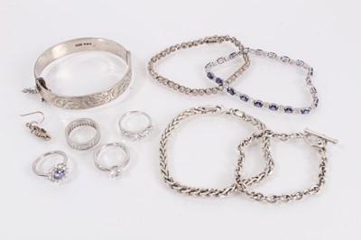Lot 833 - Group of silver jewellery to include a bangle with engraved scroll decoration (Birmingham 1981), two gem set bracelets, two other chain bracelets, four gem set rings and one seahorse earring