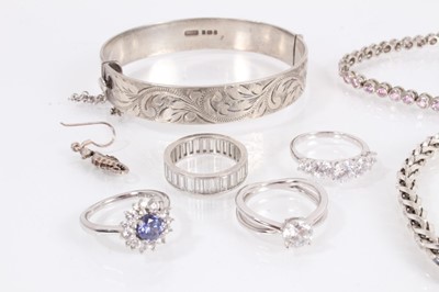 Lot 833 - Group of silver jewellery to include a bangle with engraved scroll decoration (Birmingham 1981), two gem set bracelets, two other chain bracelets, four gem set rings and one seahorse earring