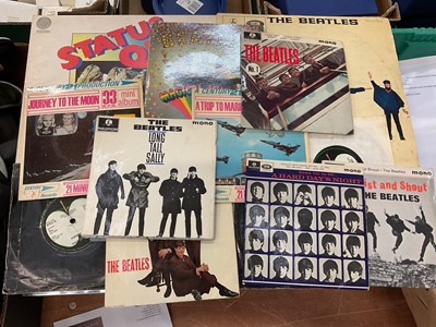 Lot 2251 - Group of Beatles singles, one Beatles LP and Status Quo singles.