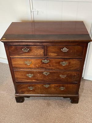 Lot 1328 - George III and later mahogany chest of two short and three long drawers with brass handles, on bracket feet