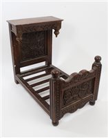 Lot 856 - Early 20th century miniature carved oak half...