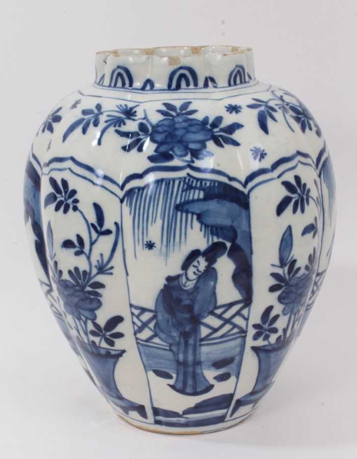 Lot 10 - 18th/19th century tin glazed pottery vase of reeded ovoid form painted segmented panels with figures and flowers