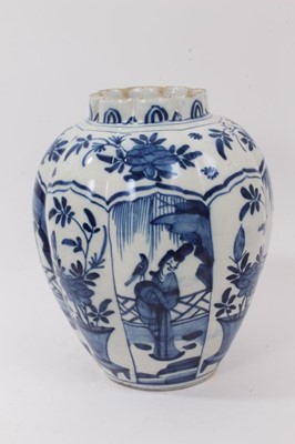 Lot 10 - 18th/19th century tin glazed pottery vase of reeded ovoid form painted segmented panels with figures and flowers