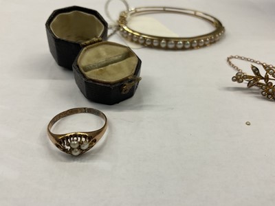 Lot 467 - Late Victorian gold and pearl hinged bangle, Victorian gold seed pearl floral spray brooch and a ring (3)